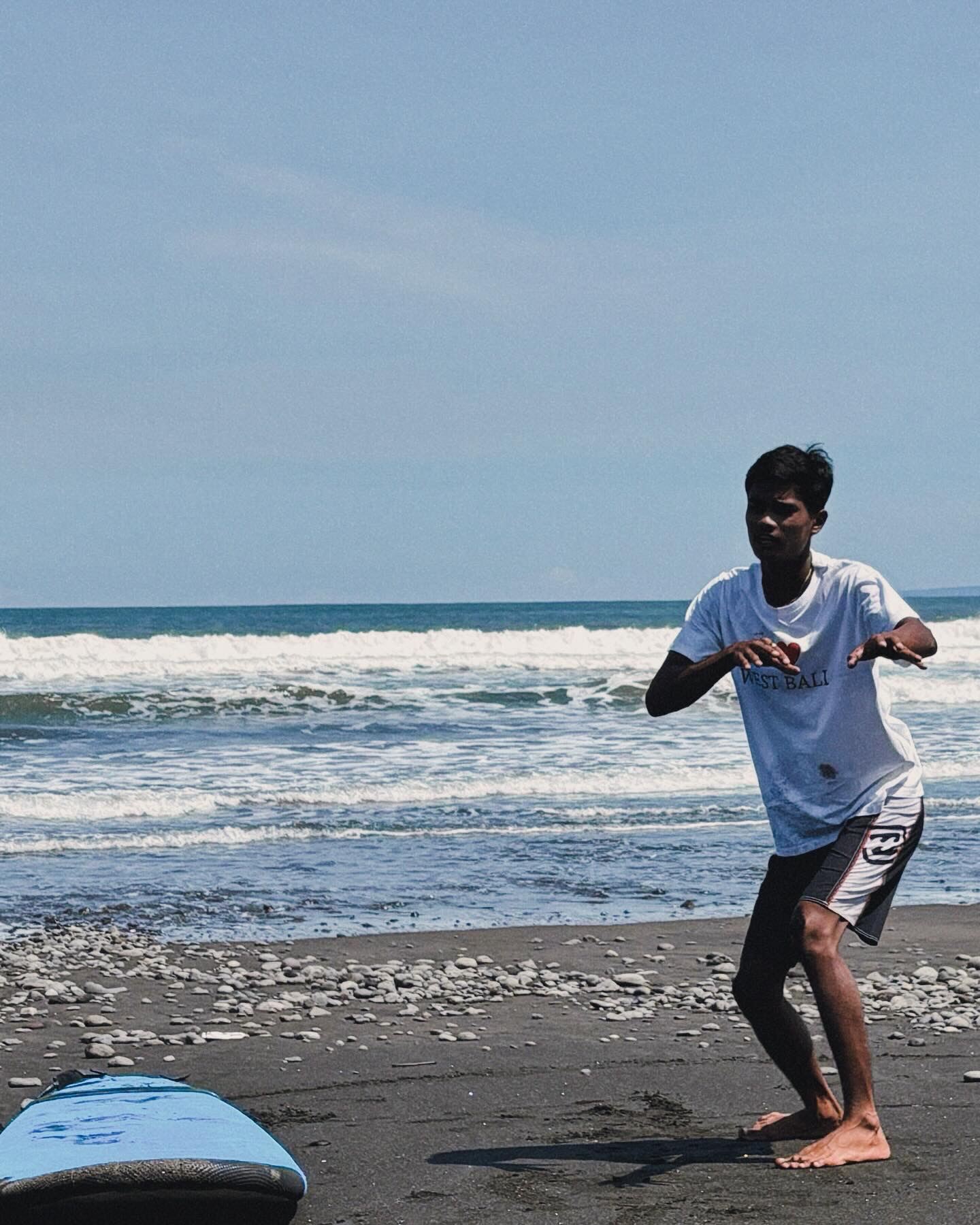 Coach Daffa with a softtop surfboard