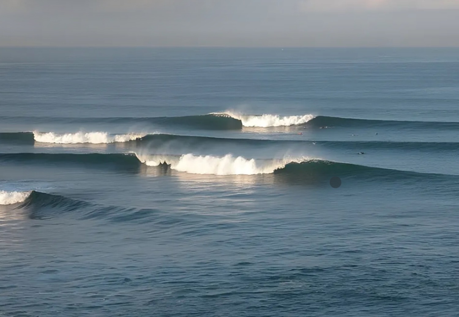 Long peeling lines at the Balian river-mouth break in West Bali