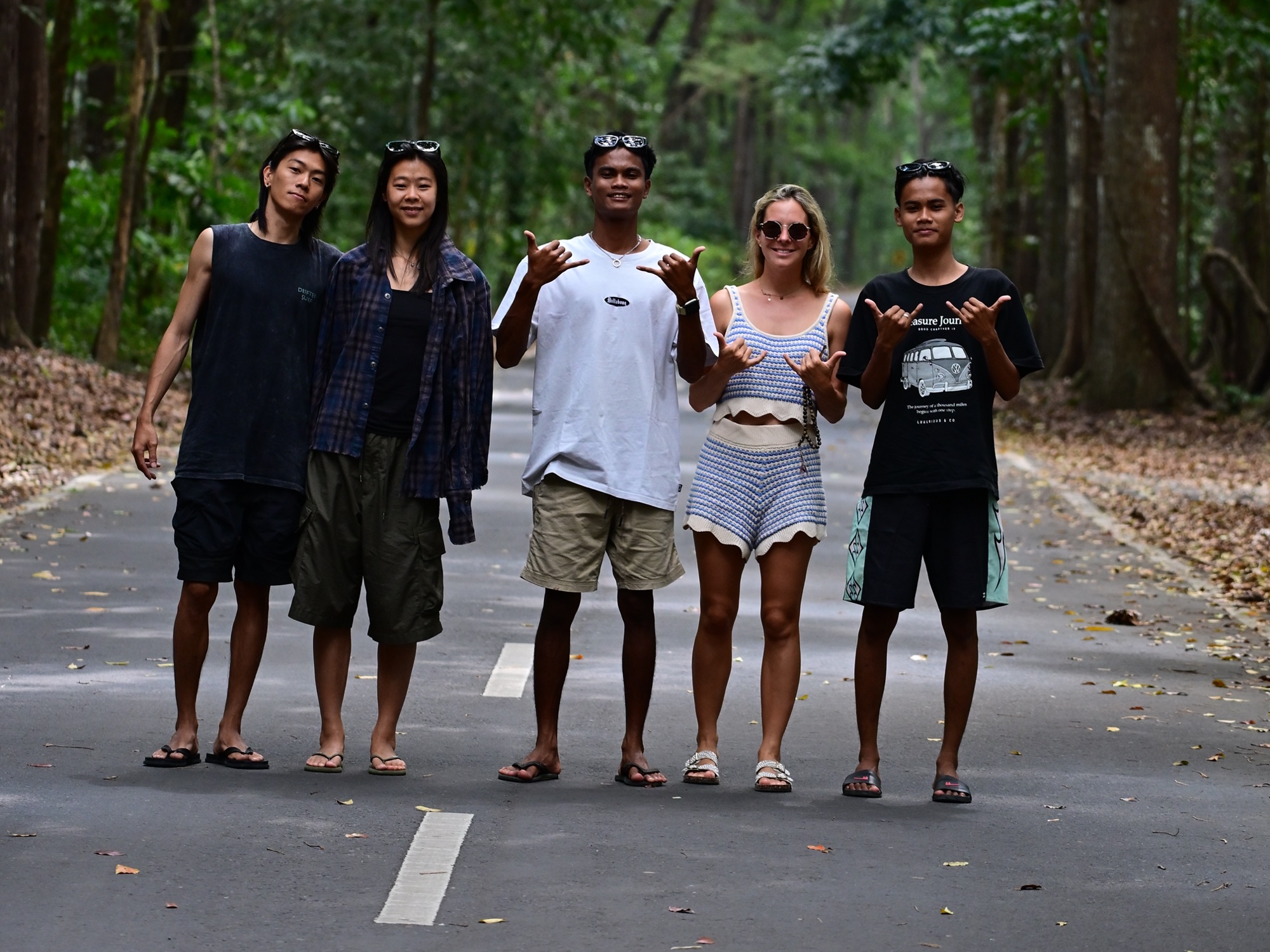 Five guests on a jungle road in Java on the way to Tiger Track